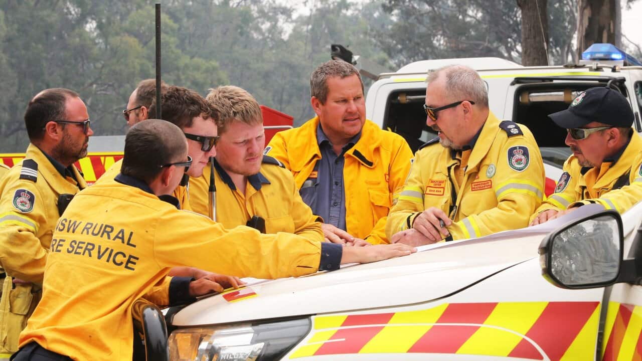 Rural Fire Service Deputy Dave Ryan prepares firefighters to tackle a bushfire