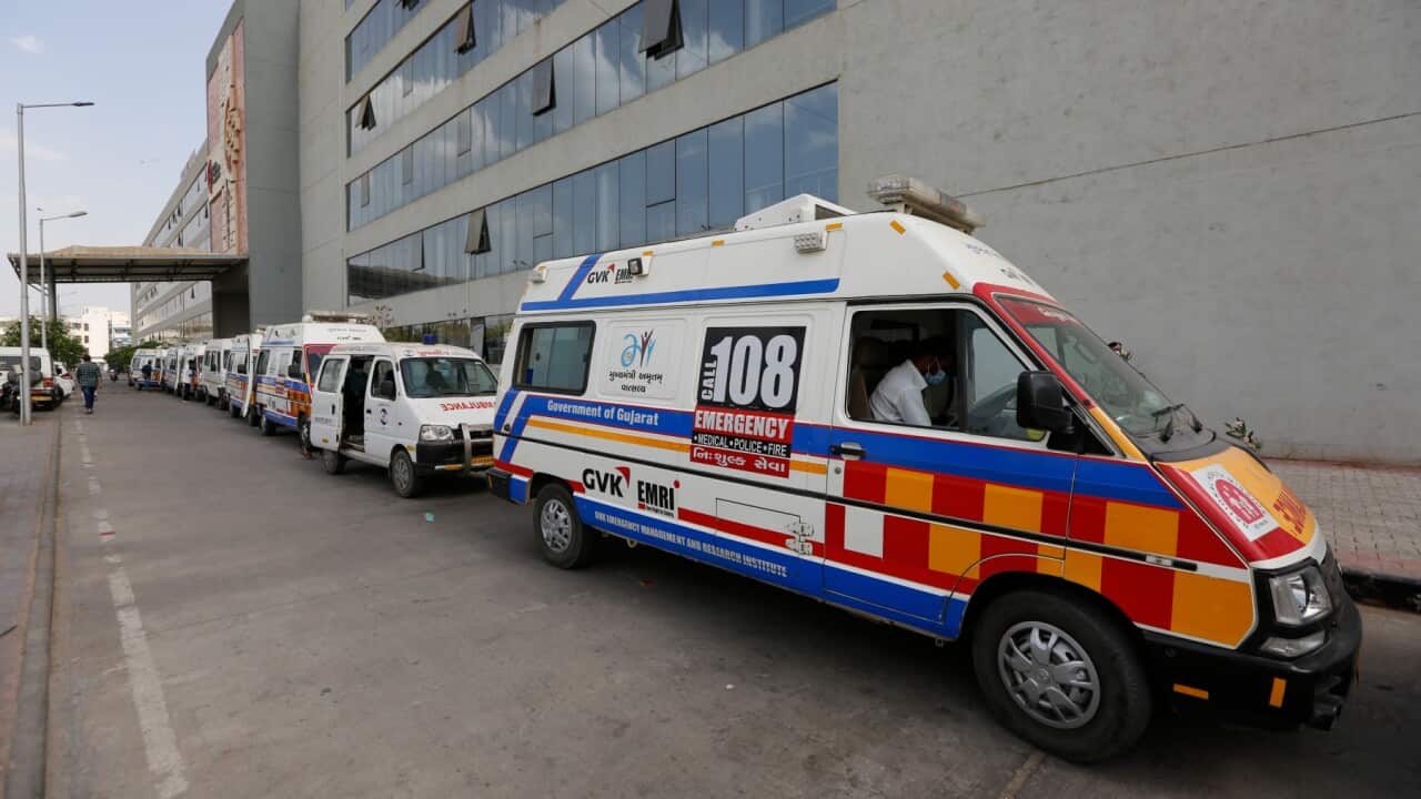 Ambulances carrying COVID-19 patients queue up waiting for their turn to be attended at a dedicated COVID-19 government hospital in Ahmedabad, India, Saturday, April 17, 2021