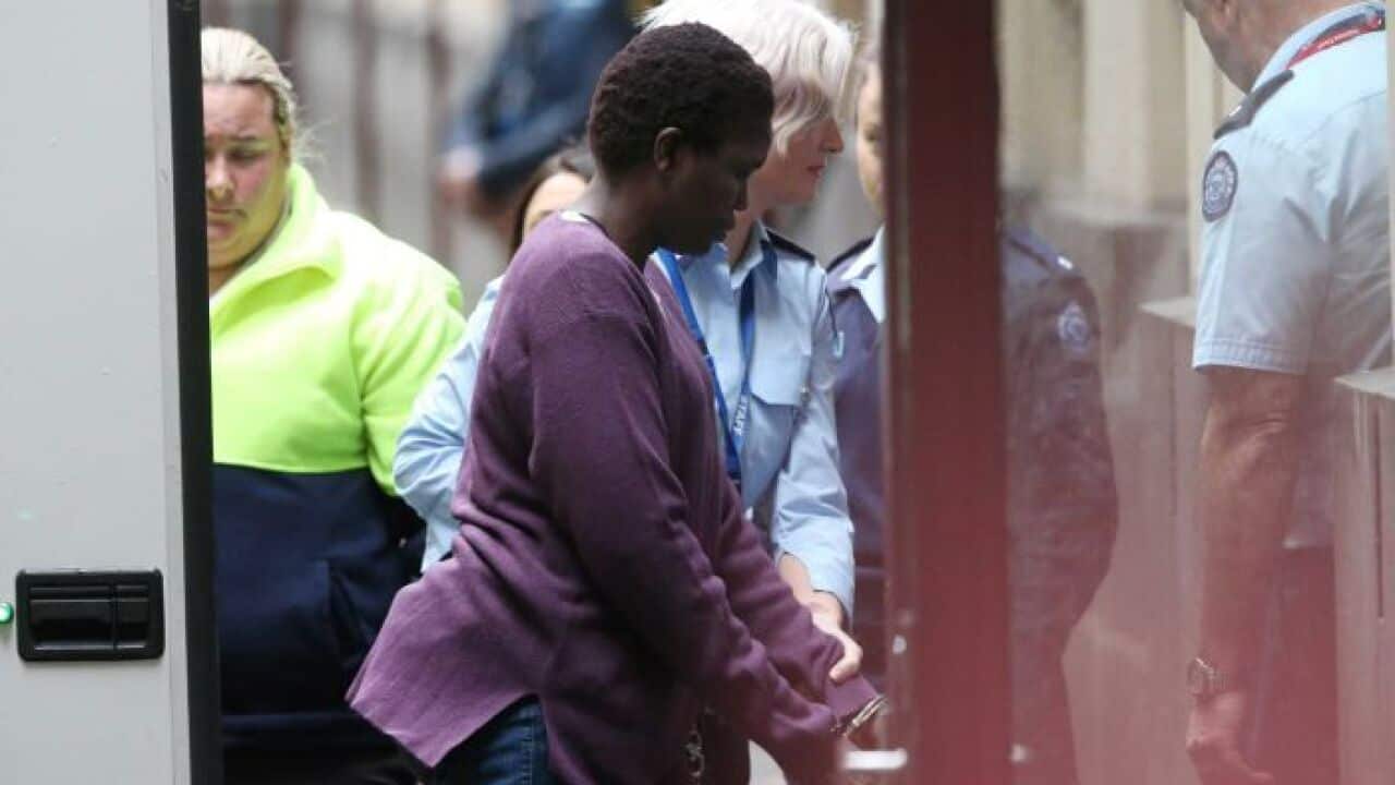 Akon Guode enters court