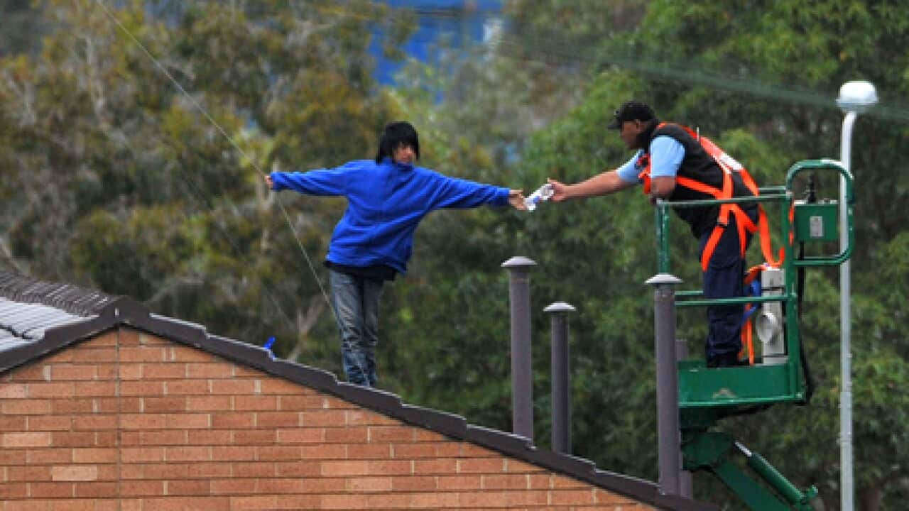 villawood_roof_water_100923_B_aap_851186747
