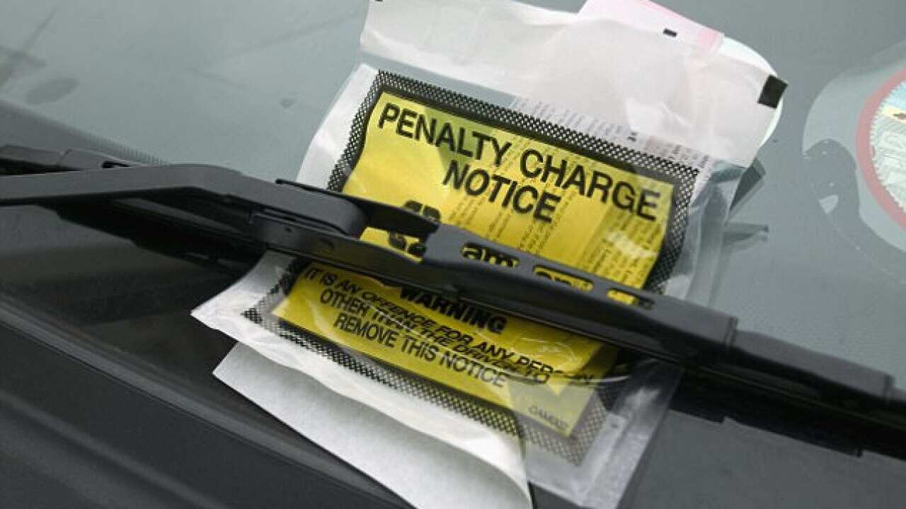 $93 fine for parking in her own driveway