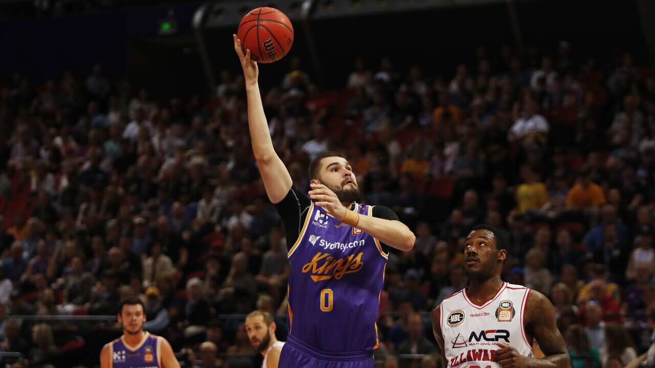 Isaac Humphries of the Kings shoots during the NBL round two match between Sydney Kings and Illawarra Hawks at Qudos Bank Arena, Sydney Olympic Park, Sunday, October 15, 2017. (AAP Image/Daniel Munoz) NO ARCHIVING, EDITORIAL USE ONLY