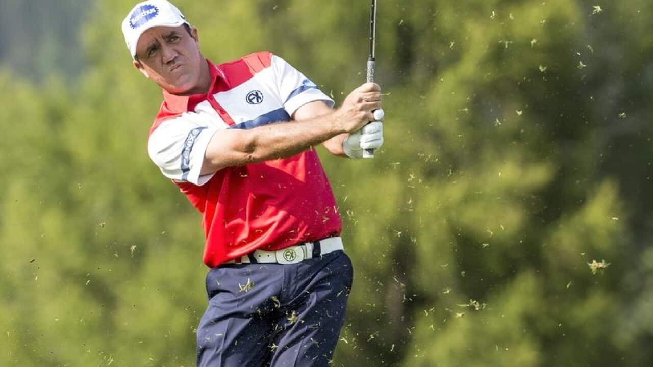 Scott Hend strikes an approach shot