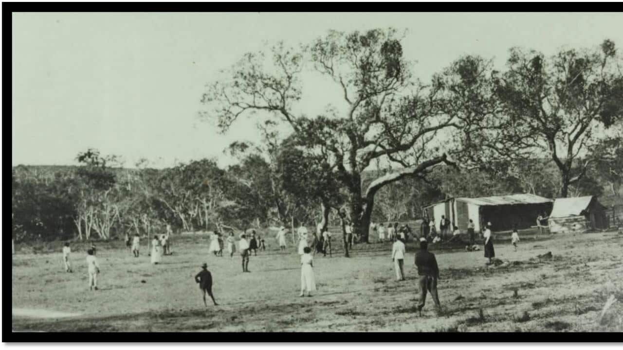 moore-river-native-settlement-group-playing-'rounders'.jpg