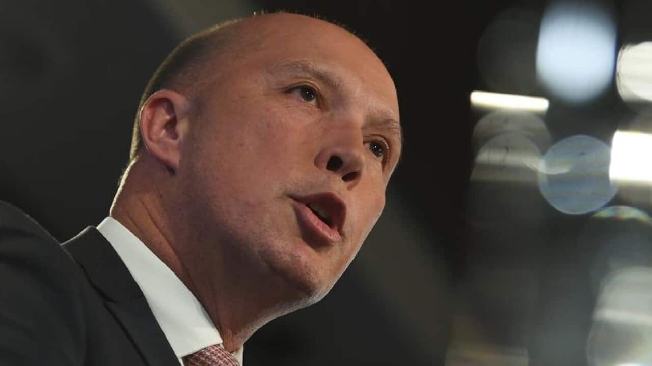 'I knew nothing of the raid, it's an issue for the AFP,' Home Affairs minister Peter Dutton says.
