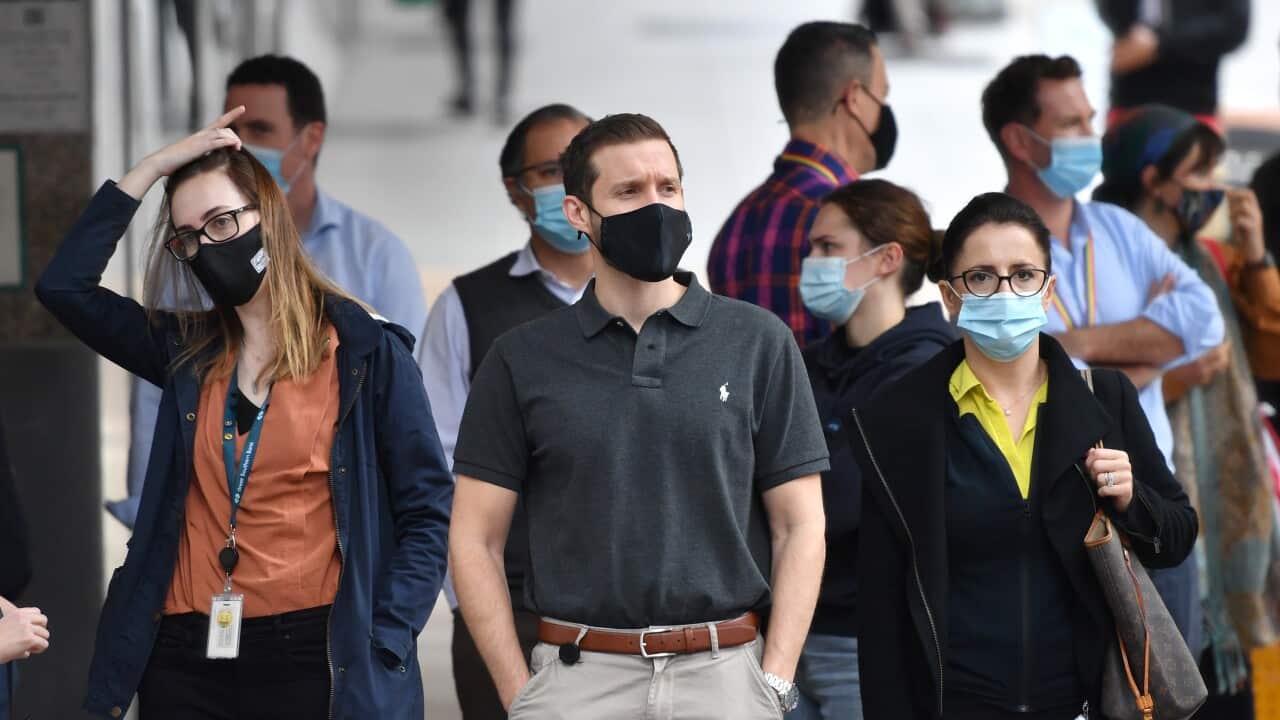 People wearing protective face masks.