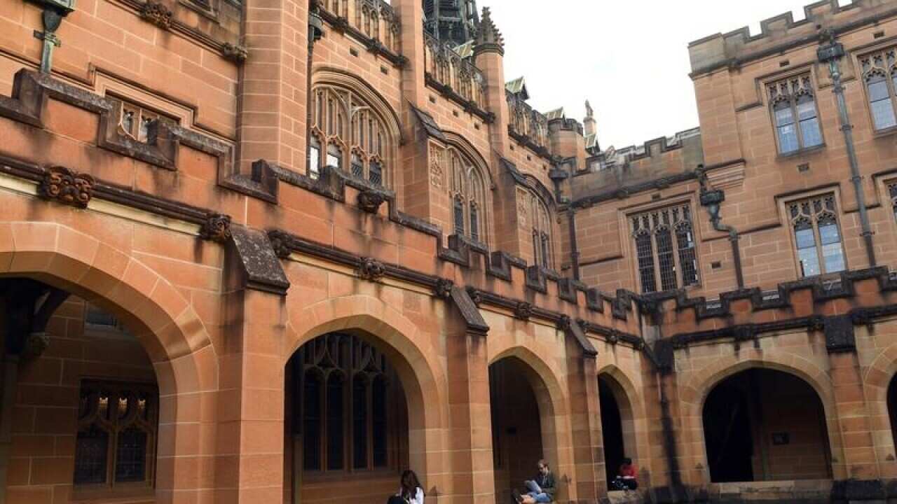 Students read at the Quadrangle of the University of Sydney
