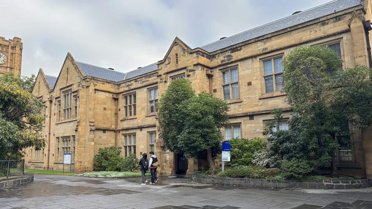 Students walking by the Old Arts building at the University of Melbourne