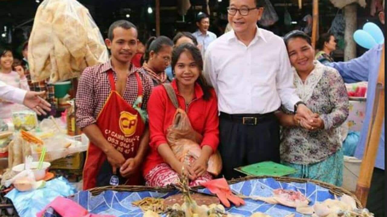 Sam Rainsy (white shirt)