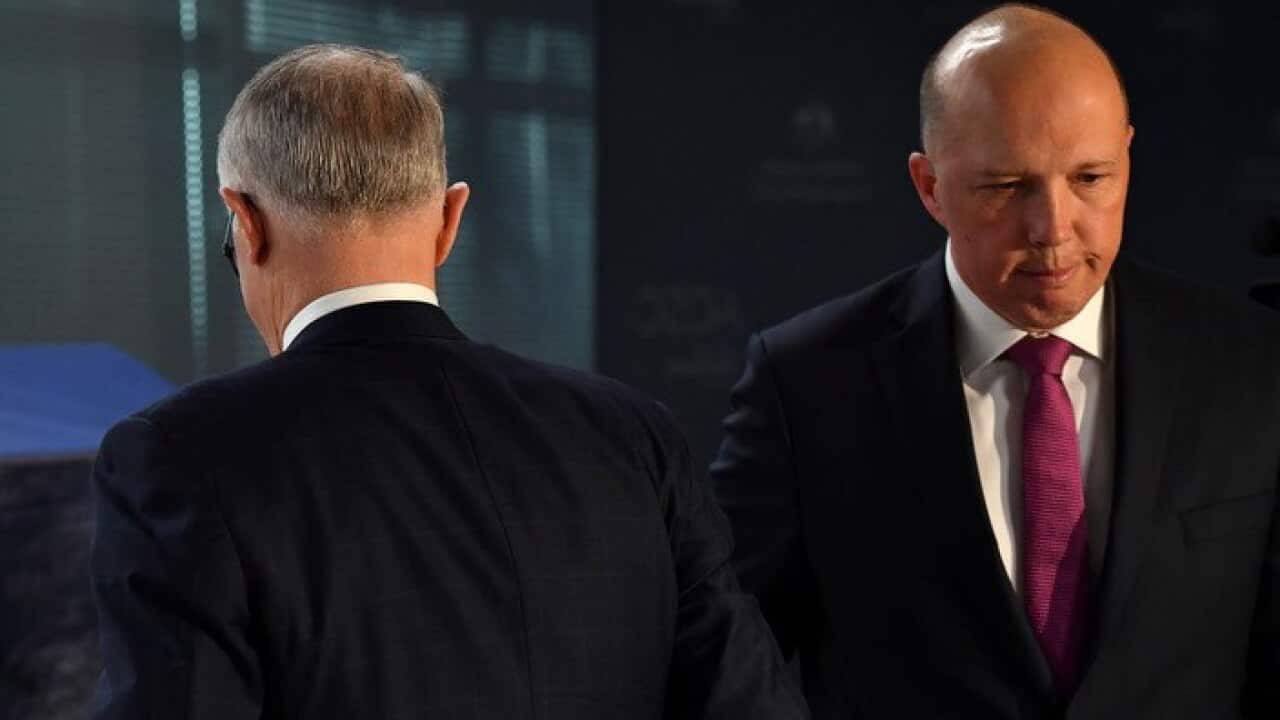 Peter Dutton, right, and Malcolm Turnbull at an official opening (AAP)