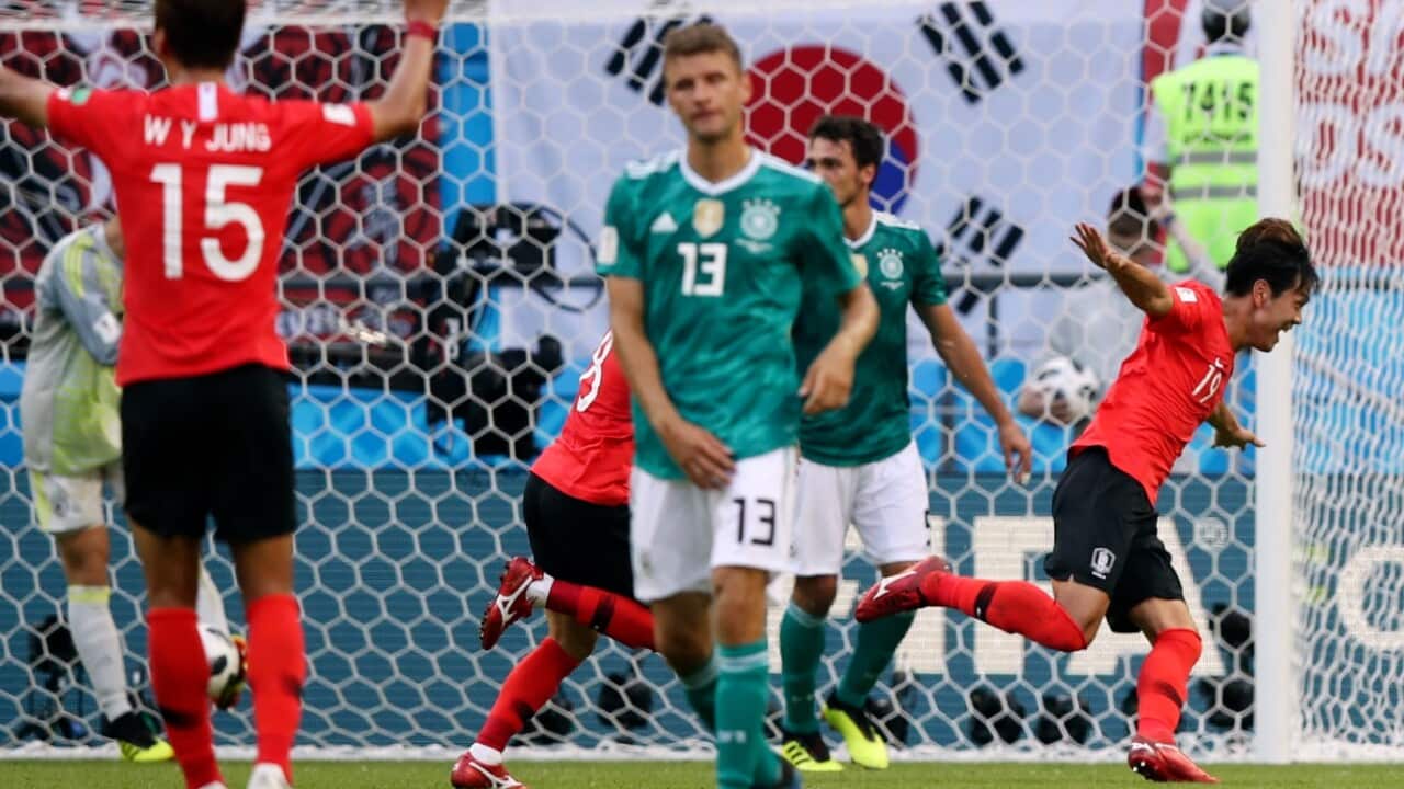 South Korea's Kim Young-gwon, right celebrates after scoring his side's first goal during the group F match between South Korea and Germany