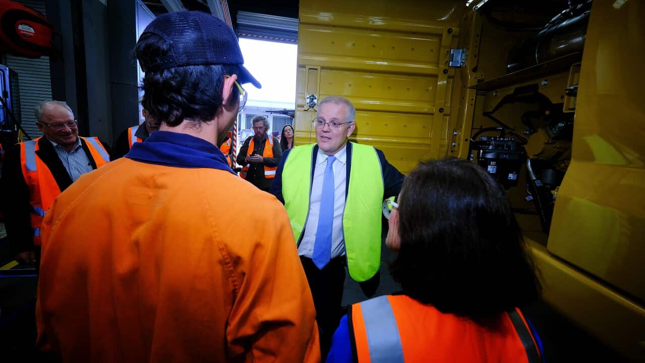 Australian Prime Minister Scott Morrison is seen during a visit to William Adams CAT, Caterpillar Dealer for Victoria and Tasmania, in Clayton, Melbourne, Monday, April 4, 2022. (AAP Image/Luis Ascui) NO ARCHIVING