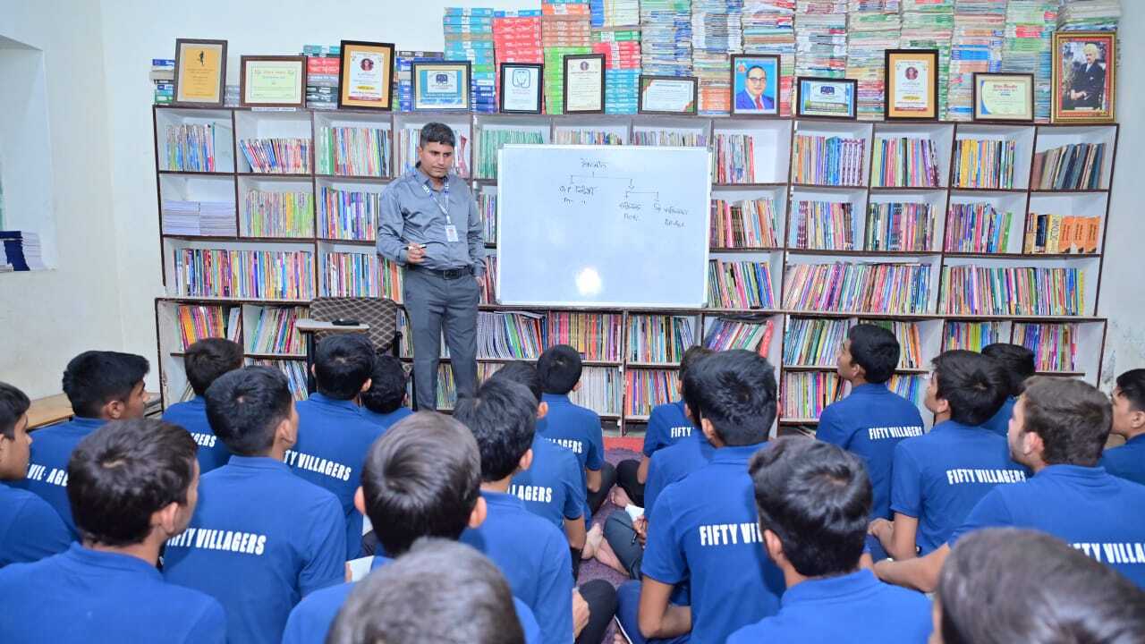 Dr. Bharat Saran teaching students