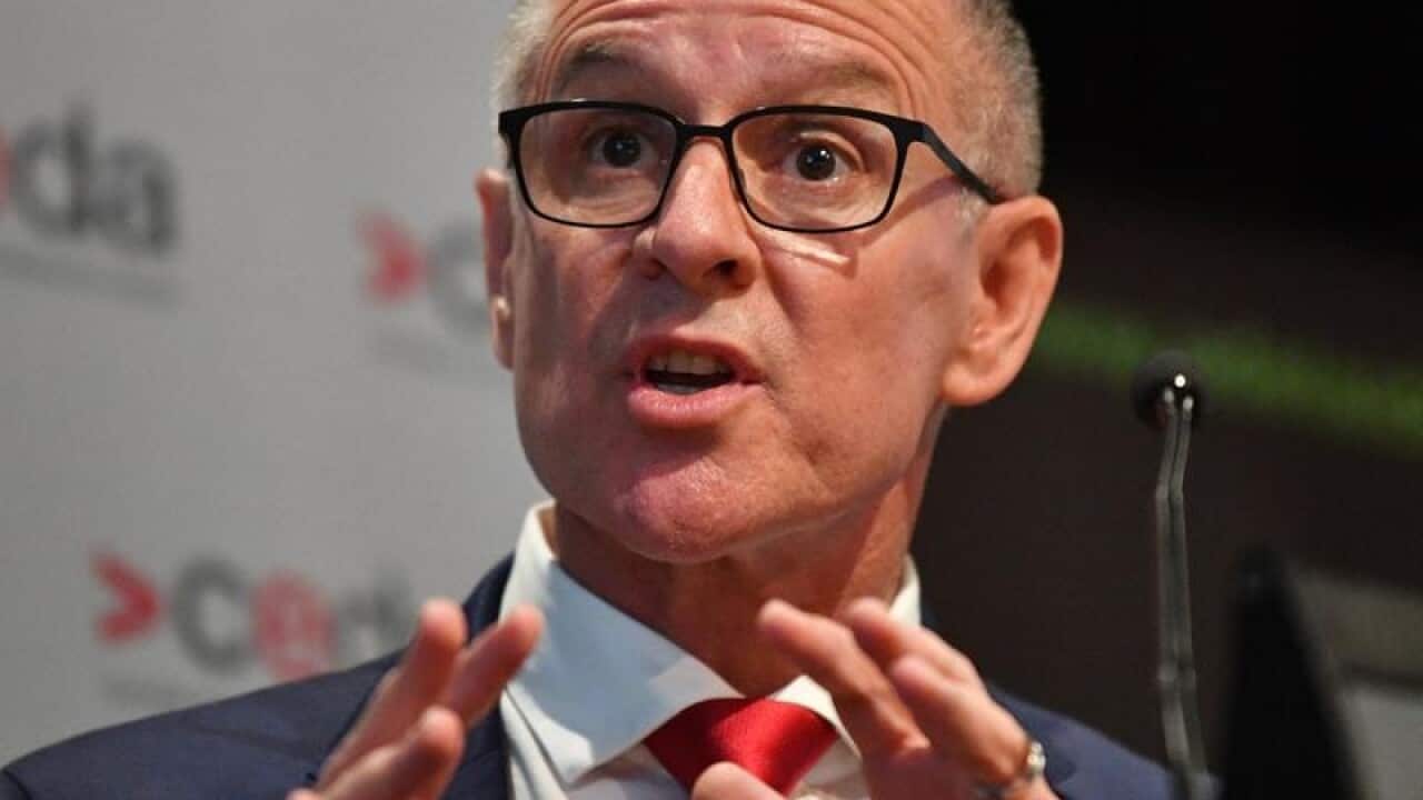SA Premier Jay Weatherill makes hand gestures are he speaks on stage.