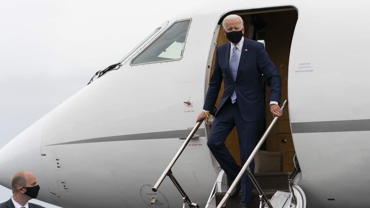Democratic presidential candidate Joe Biden arrives at an airport in Delaware