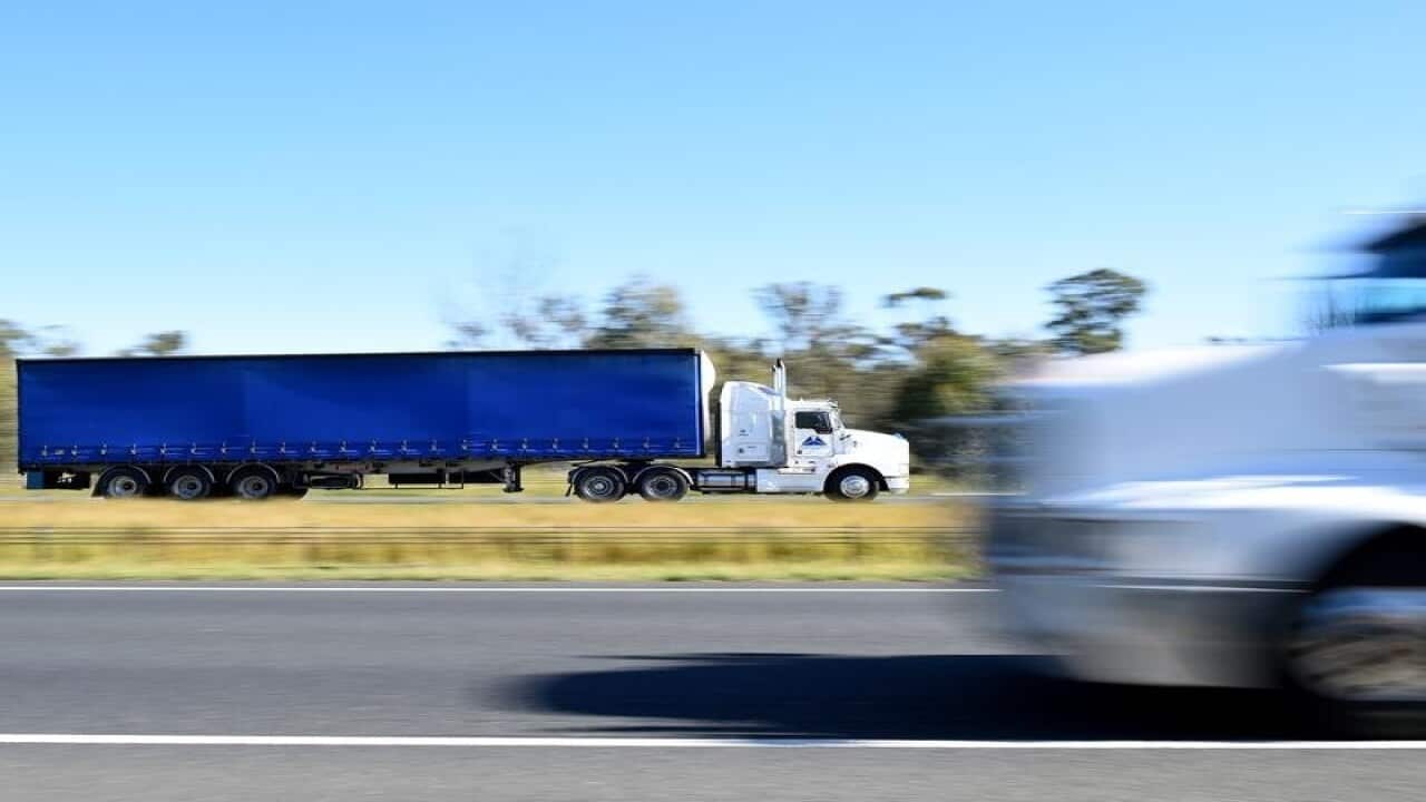 General view of heavy transport on the M7 motorway in Sydney.
