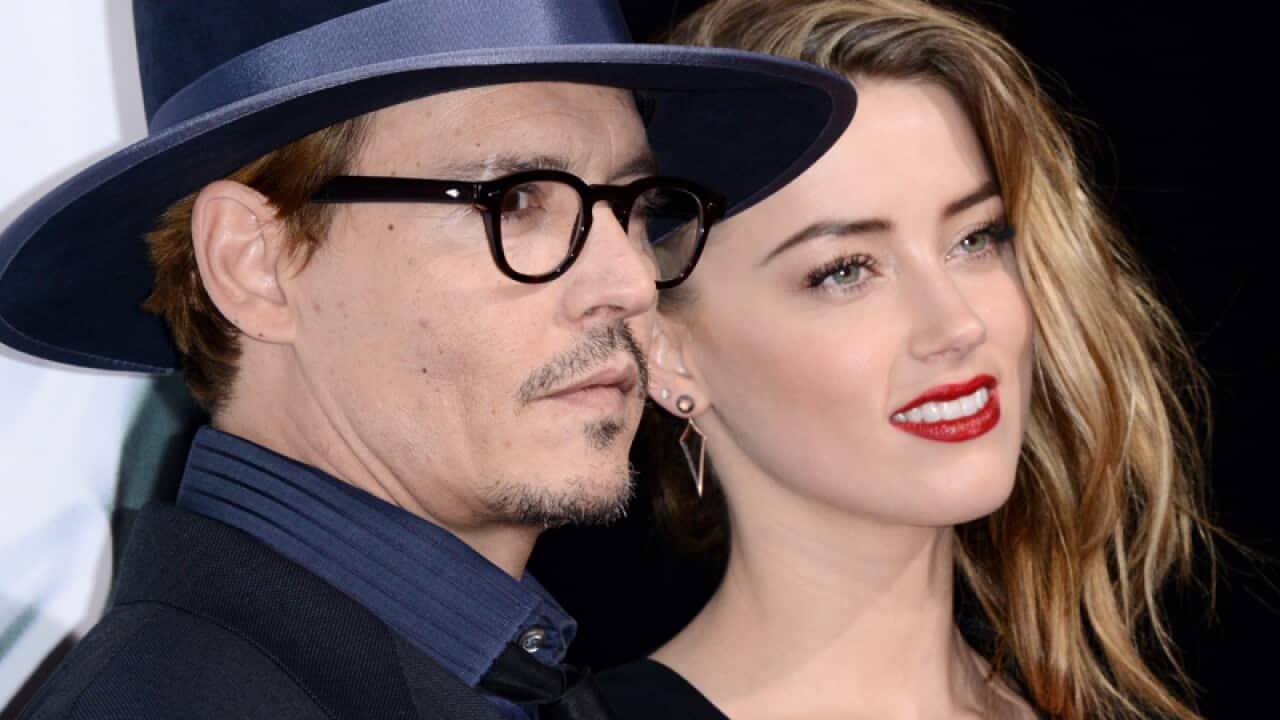 Johnny Depp (L) and Amber Heard