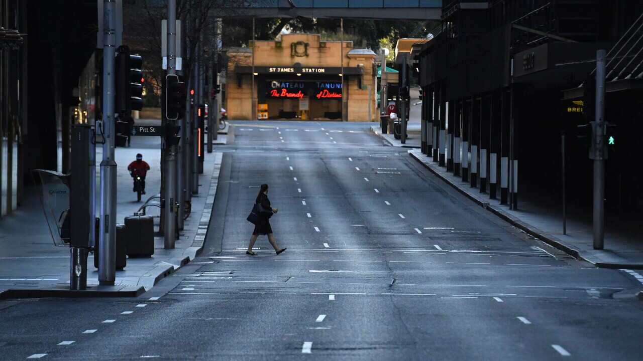 A near empty Market Street is seen in the central business district in Sydney, Thursday, July 29, 2021. NSW recorded 236 new locally acquired cases of COVID-19 in the 24 hours to 8pm last night. (AAP Image/Mick Tsikas) NO ARCHIVING