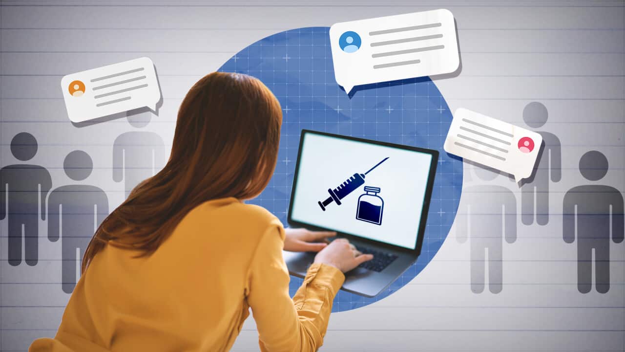 A woman at laptop with a vial and syringe on the screen.