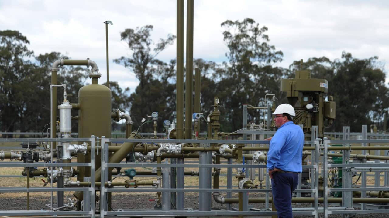 Santos staff at the Tinsfield coal seam gas pilot well