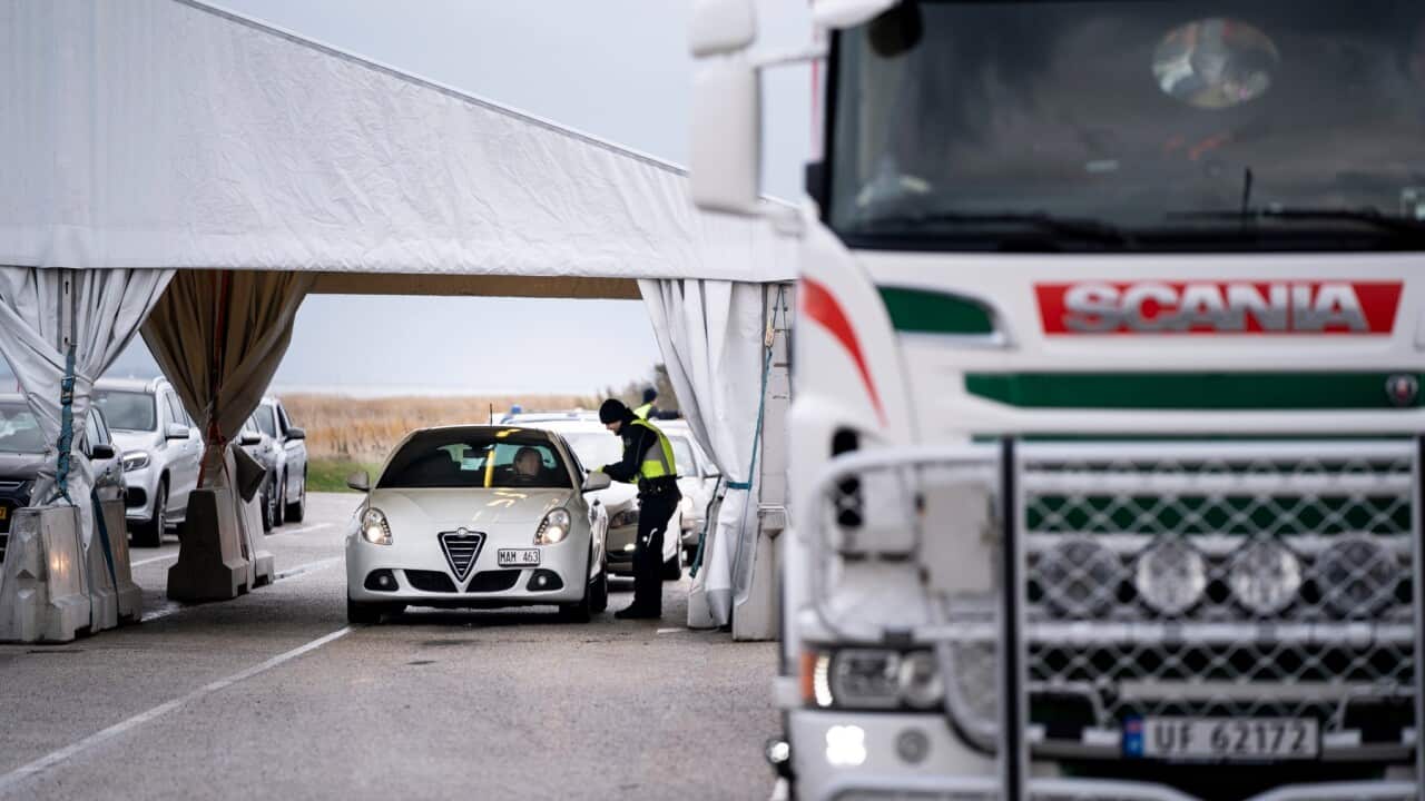 Danish police control travellers from Sweden, after border checks were reinstated