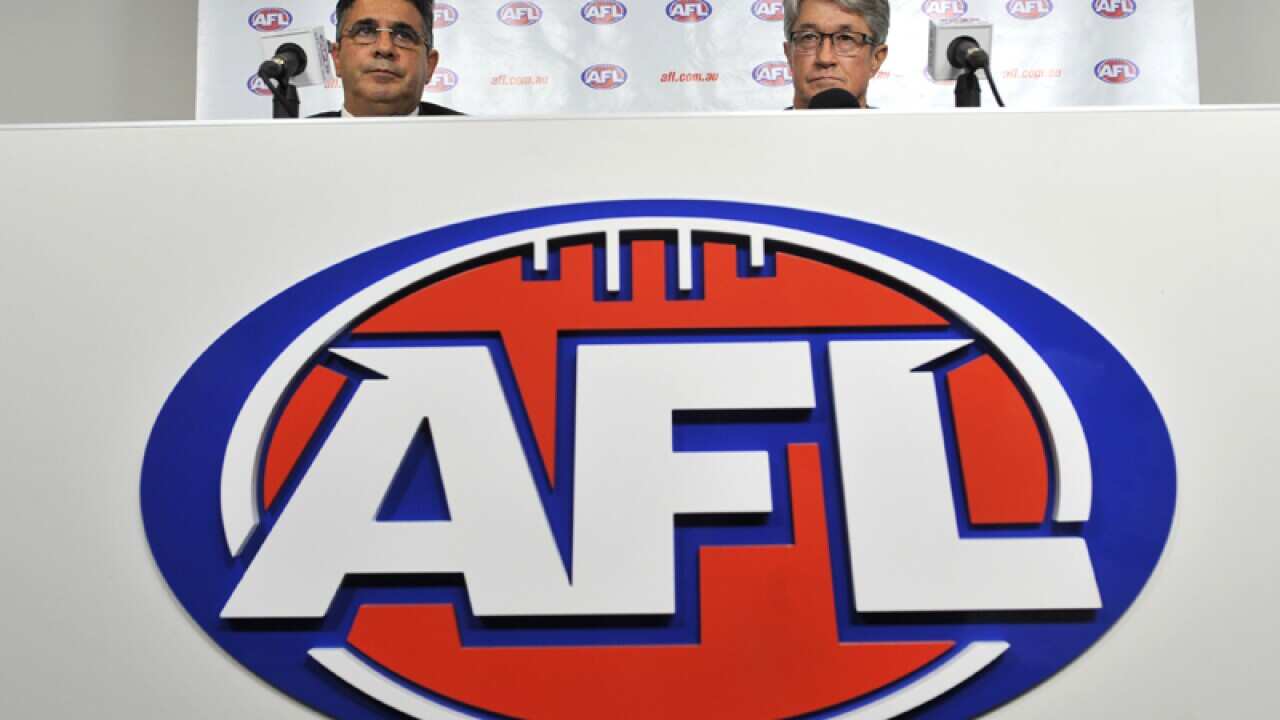AFL CEO Andrew Demetriou (L) and chairman Mike Fitzpatrick