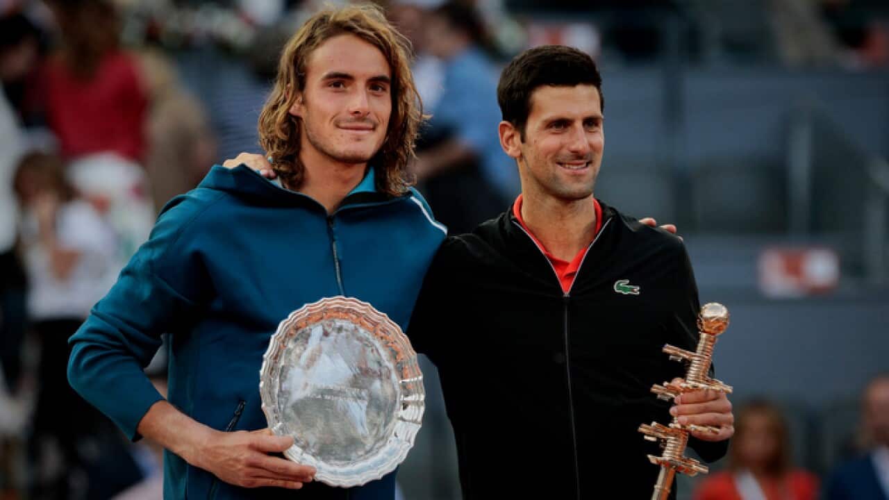 Stefanos Tsitsipas and Novak Djokovic are seen after the Mutua Madrid Open Masters final match on day eight at Caja Magica in Madrid.Novak Djokovic beats Stefanos Tsitsipas.