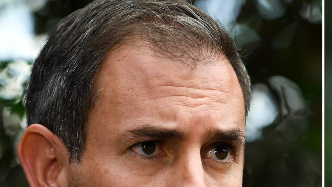 A combined image shows (left) Shadow Treasurer Jim Chalmers in Brisbane on Monday, April 18, 2022 and (right) Treasurer Josh Frydenberg in Melbourne on Tuesday, May 3, 2022. (AAP Image/Lukas Coch, Joel Carrett) NO ARCHIVING