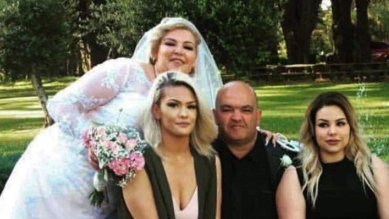 Stavros Kostaras and his daughters