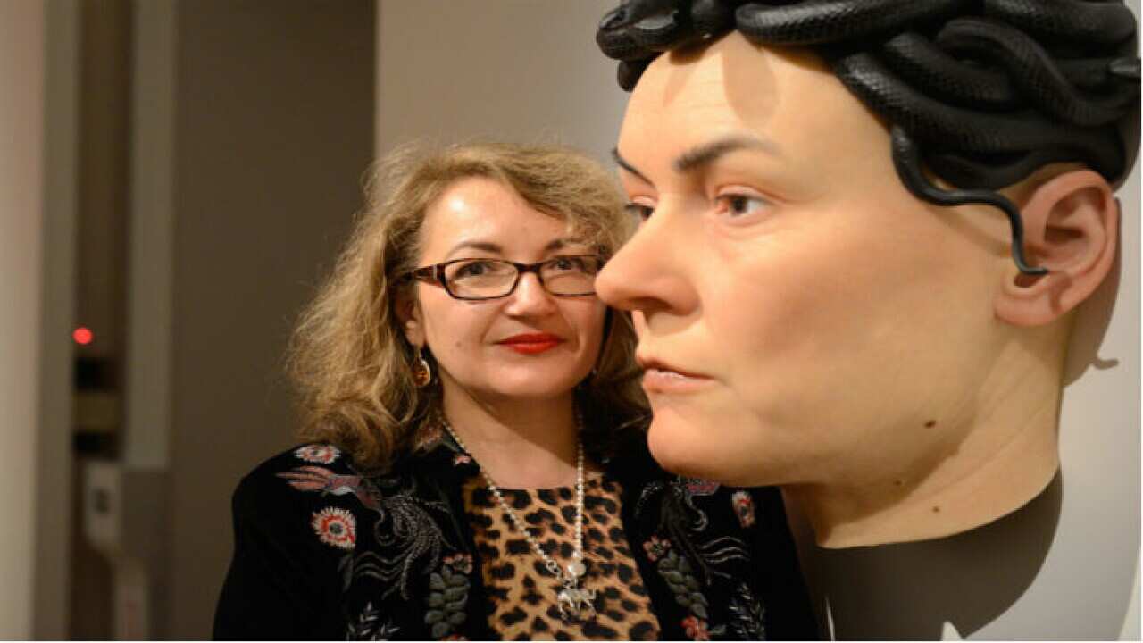 Evelyn Tsitas, with Sam Jinks' sculpture Medusa (Beloved), 2016 . Collection of Latrobe Art Institute, Bendigo.