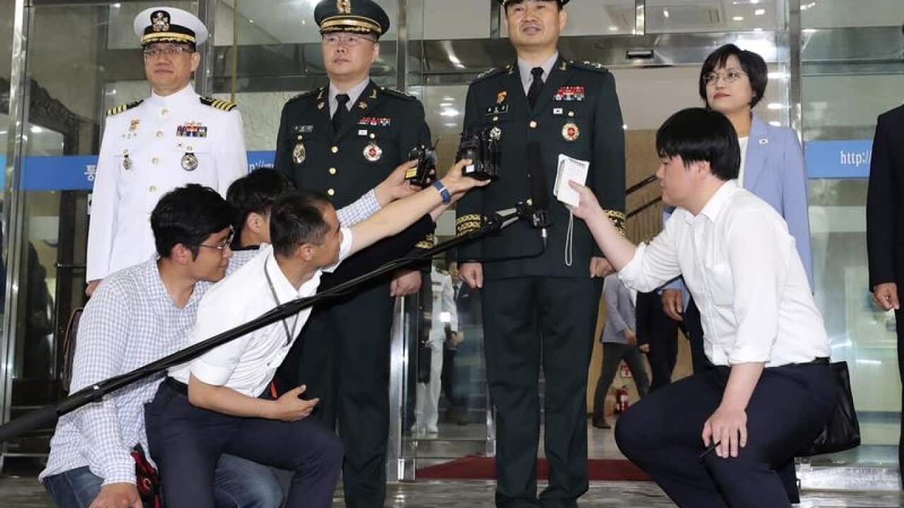 South Korean Major General Kim Do-gyun (centre)