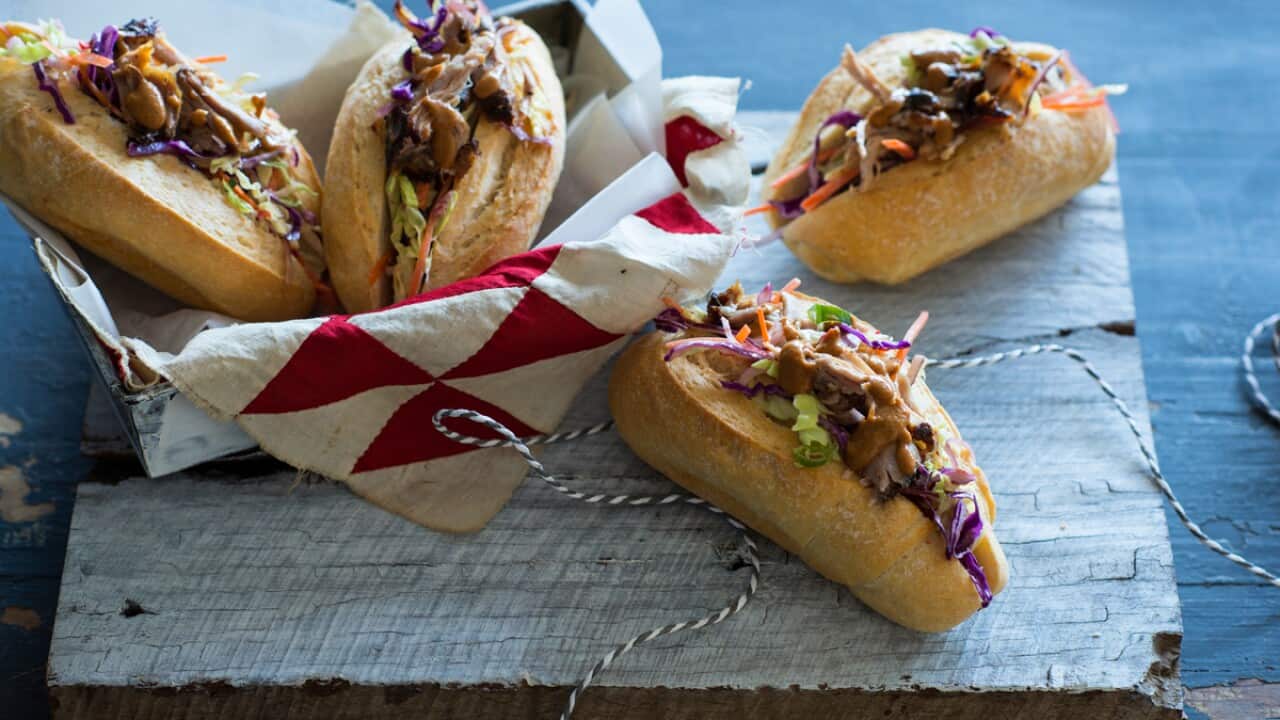 Spicy pulled pork rolls with coleslaw and barbecue sauce
