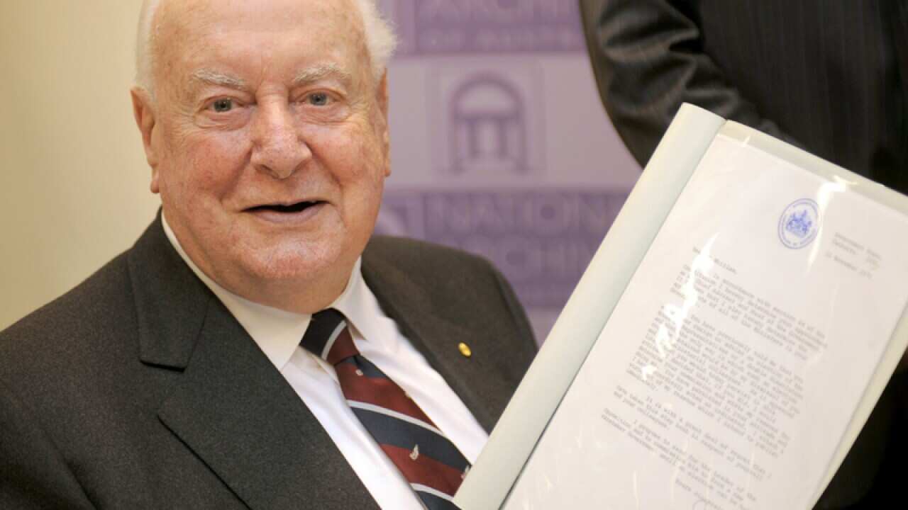Gough Whitlam with his letter of dismissal.