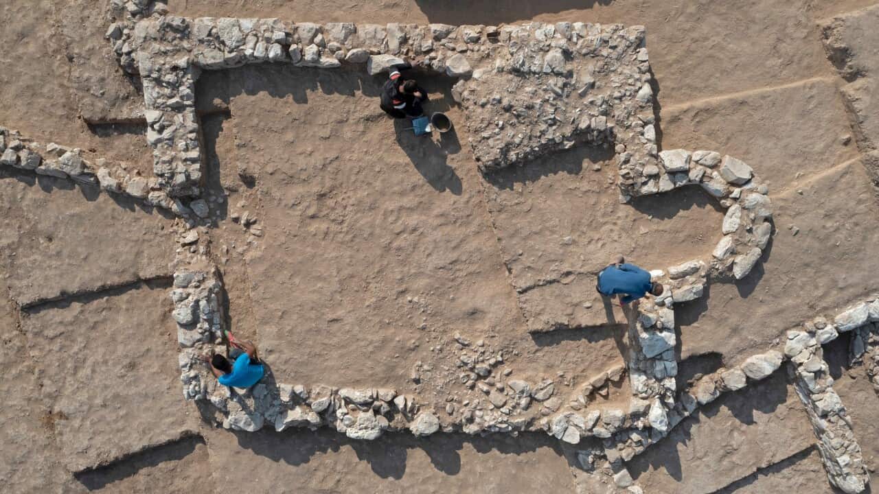 An aerial view shows Palestinian workers of Israel's Antiquities Authority during work at a recently discovered ancient mosque, which dates back to the early Islamic period.