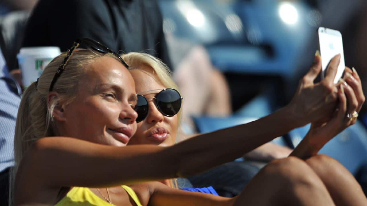 People taking a selfie