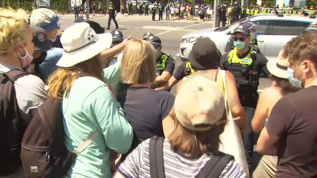 Protesters try to stop transfer of detainees from Mantra Hotel