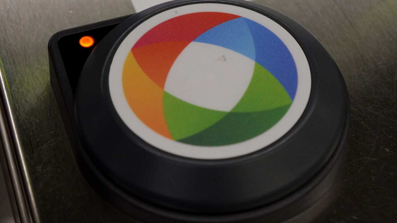 An Opal card reader at a train station