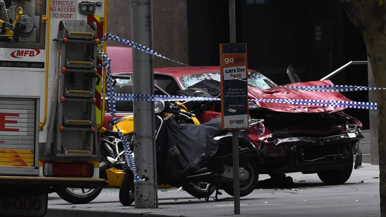 Police and Emergency services at the scene where man has gone on a rampage in a car through busy Bourke St mall, Melbourne, Friday, Jan. 20, 2017.