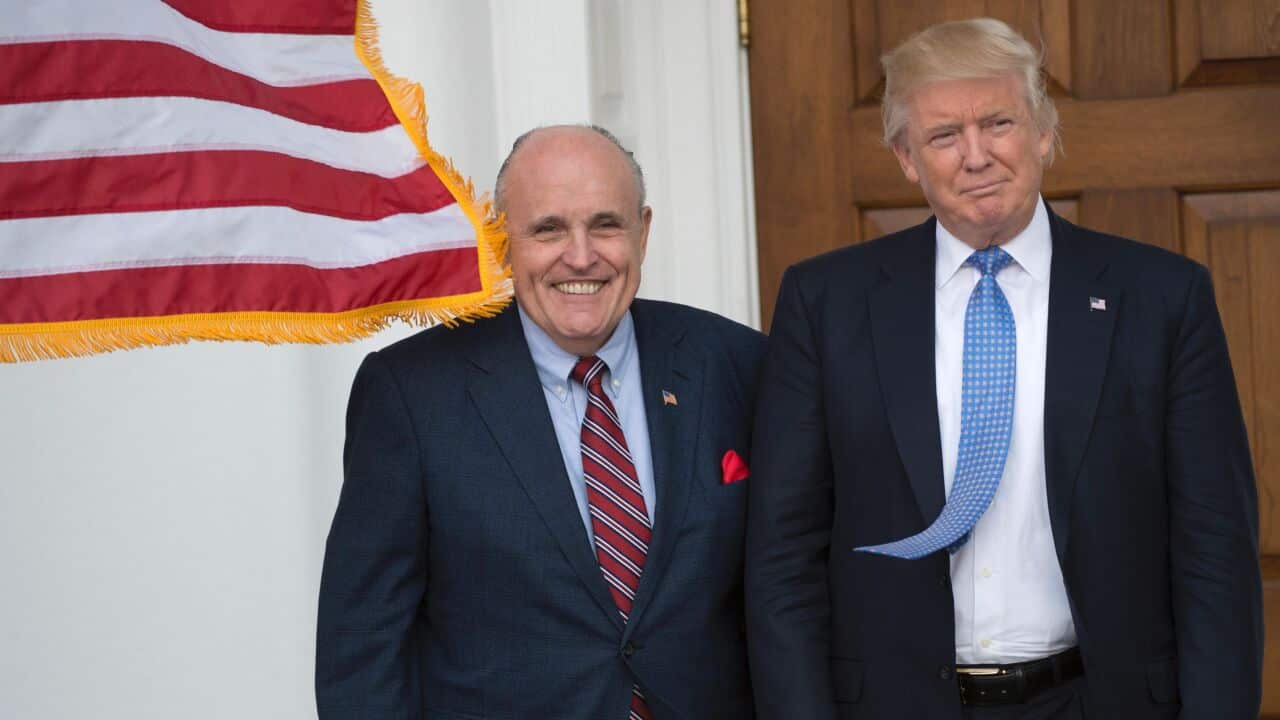 US President Donald Trump has come to the defence of his lawyer Rudy Giuliani, describing his close confidant as a 'legendary crime buster.'