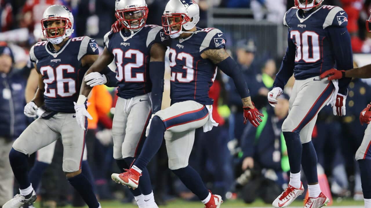 New England Patriots celebrate a defensive stop against the Kansas