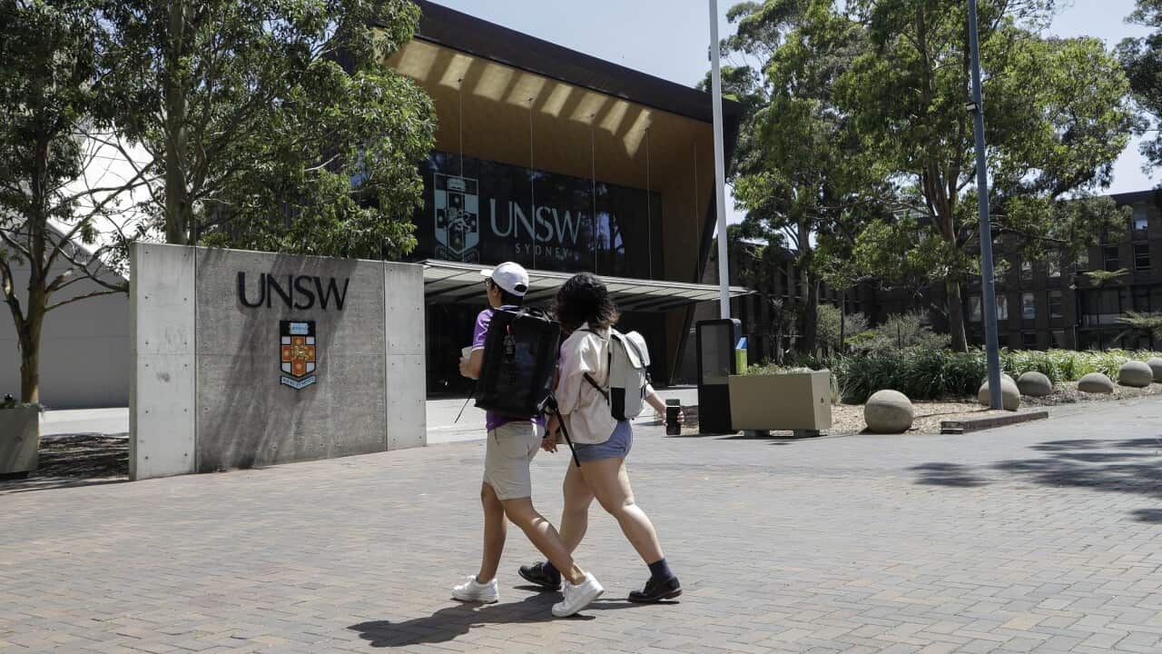 Students walk around the University of New South Wales campus in Sydney, Australia.