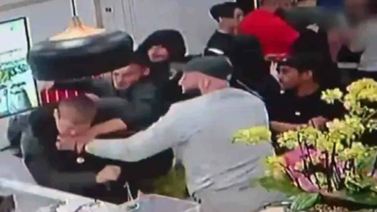 Customers restrained a drunk man rampaging a bubble tea store at Granville