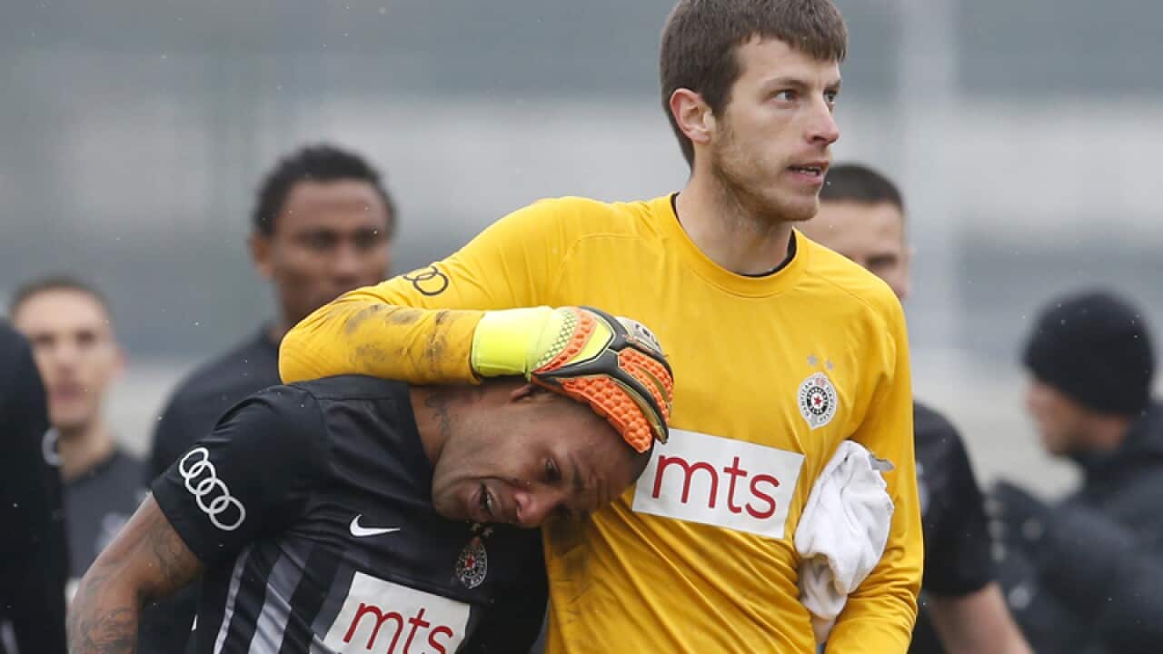 Partizan's Brazilian midfielder Everton Luiz (L)