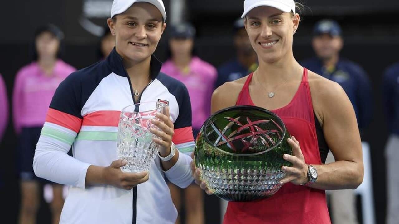 Ashleigh Barty (l) and Angelique Kerber poses for a photograph.