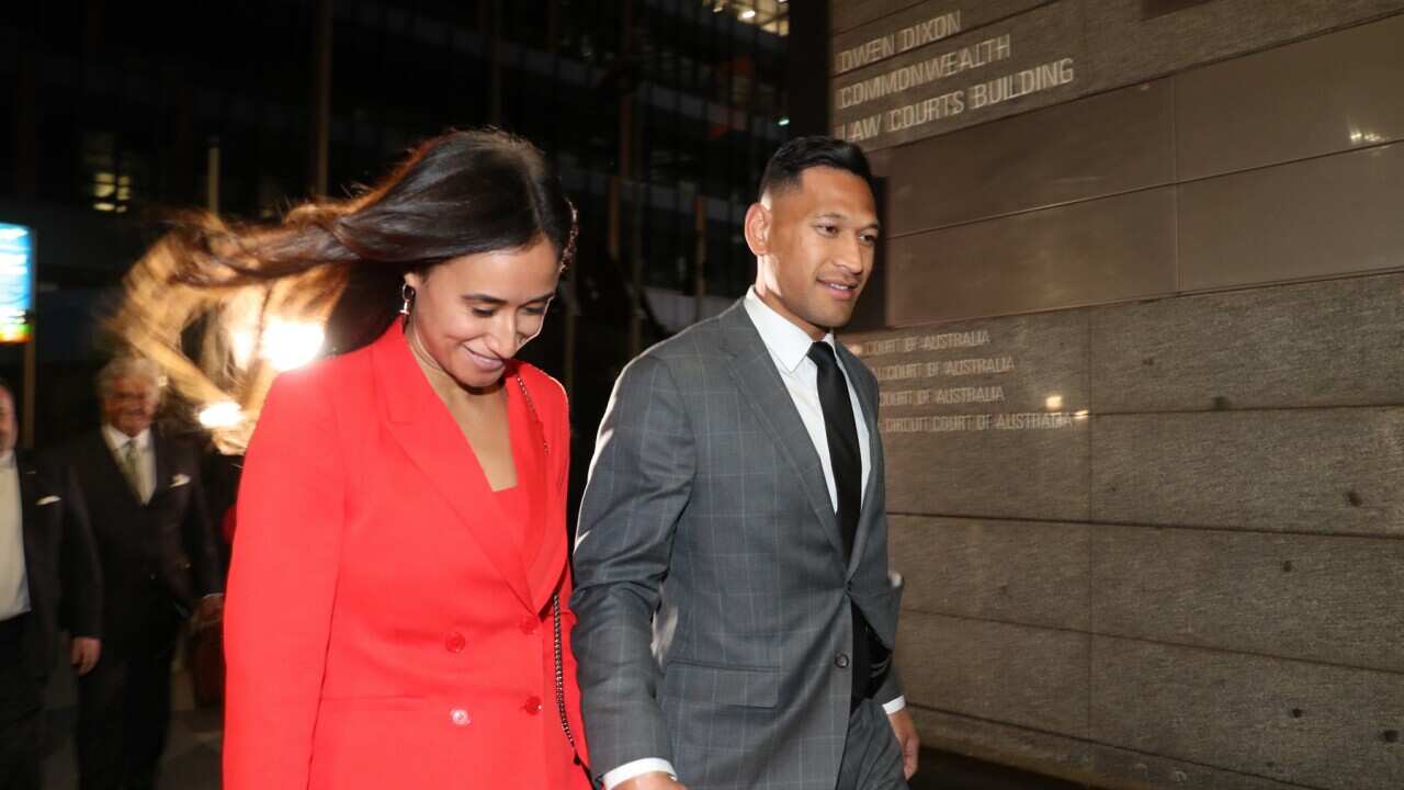 Israel Folau and his wife Maria leave the Federal Court