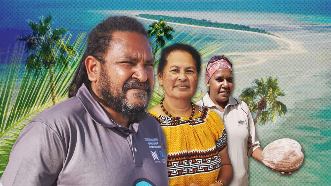 Three Masigalgal people, a man and two women, look towards the camera. An island with palm trees can be seen in the distance.