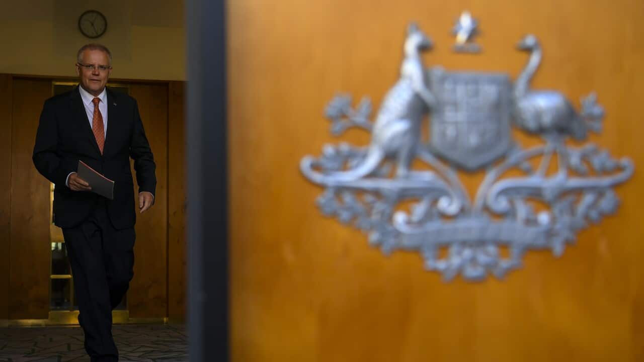 Australian Prime Minister Scott Morrison arrives to speak to the media during a press conference at Parliament House in Canberra, Wednesday, February 13, 2019. (AAP Image/Lukas Coch) NO ARCHIVING