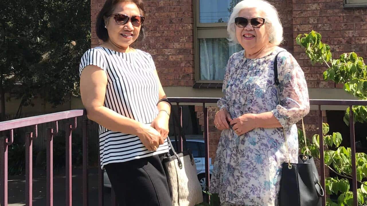 From left, Nur Green and Sandra Mulia visiting Cantebury Nursing Home for a Christmas lunch.