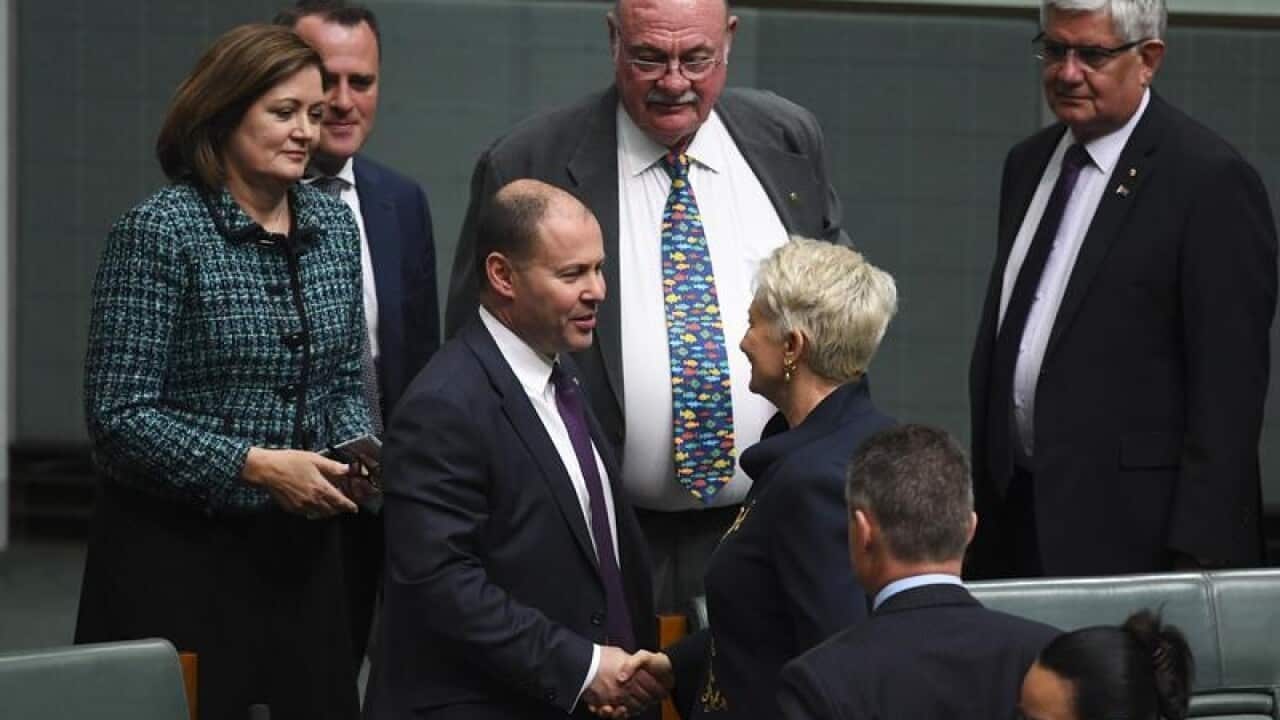 Josh Frydenberg congratulates Kerryn Phelps after her maiden speech.