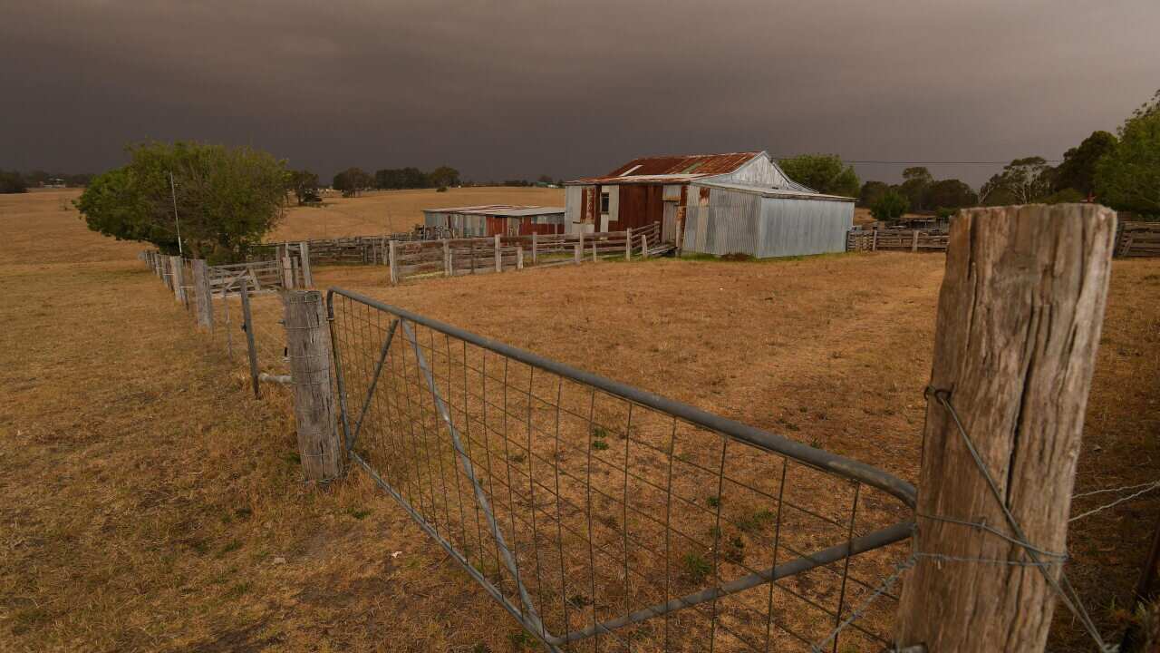 Bushfire smoke blankets a property at Bairnsdale, Victoria.